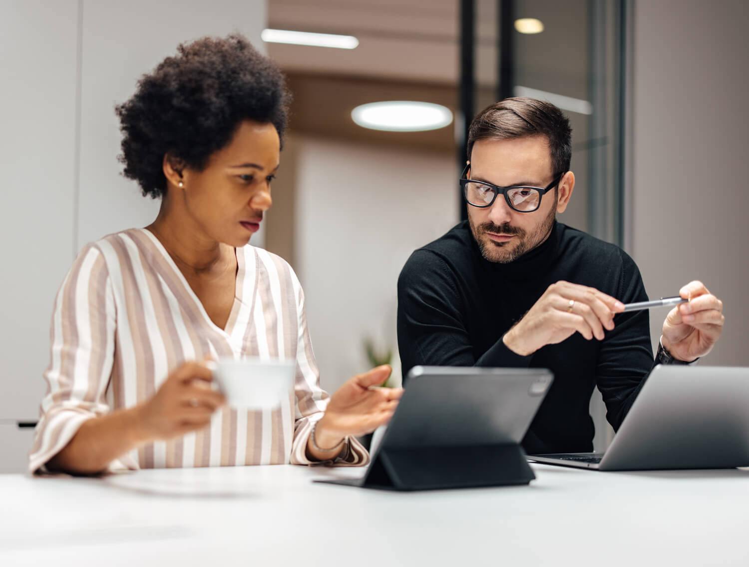 Coworkers collaborating on a project. 